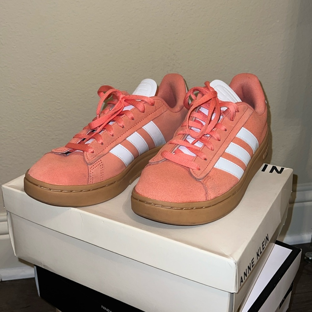 Coral Adidas sneakers